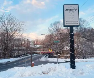 Old Mill Cafe Street Sign