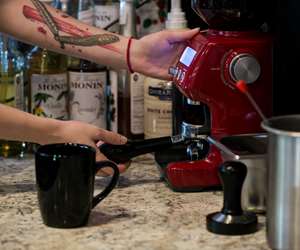 Barista Grinding Espresso