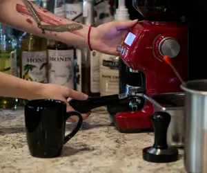 Barista Grinding Espresso