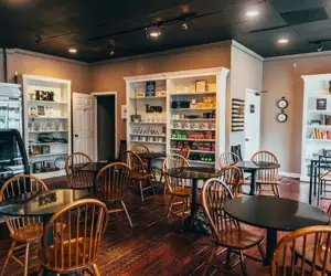 Indoor seating, cafe, coffee shop, bookshelf 